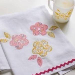 制作布艺花朵图案贴花餐巾的做法威廉希尔中国官网
