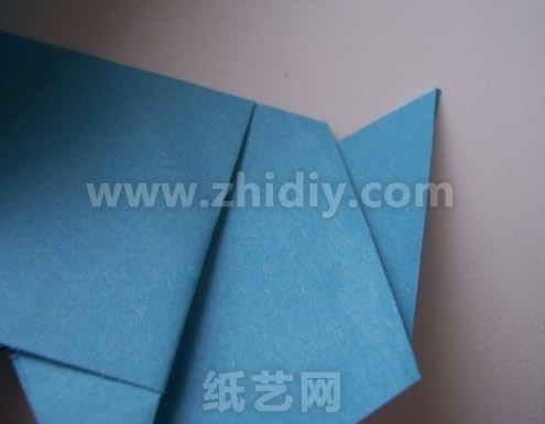 威廉希尔公司官网
折纸小狗制作威廉希尔中国官网
图解折纸过程中的第三十步