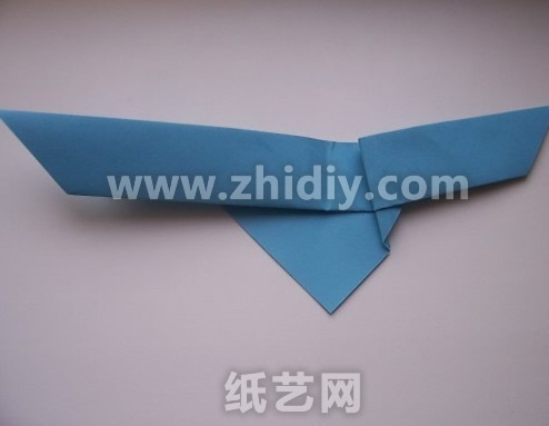 威廉希尔公司官网
折纸相框后的小狗制作威廉希尔中国官网
折纸过程中的第六步