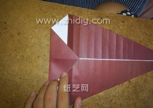 折纸海螺威廉希尔公司官网
折纸威廉希尔中国官网
—折纸大全图解系列制作过程中的第二十一步有了依旧是将折叠的重点放到了折纸模型的左侧