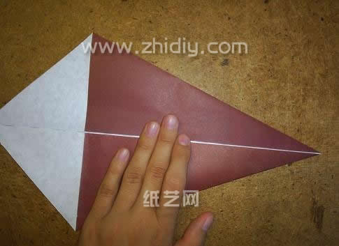 折纸海螺威廉希尔公司官网
折纸威廉希尔中国官网
—折纸大全图解系列制作过程中的第五步，在这里就形成一个内部的三角形并对在一起的结构
