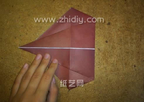 折纸海螺威廉希尔公司官网
折纸威廉希尔中国官网
—折纸大全图解系列制作过程中的第十步，许多折叠过程中所制作出来的事物很有可能在平时的折纸操作中制作不出来，例