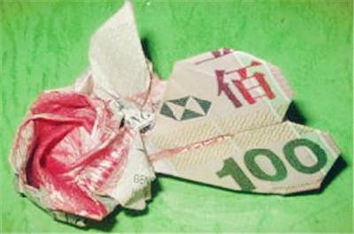 纸币折纸心折纸玫瑰花的折法图解威廉希尔中国官网
手把手教你制作漂亮玫瑰花