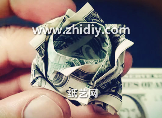 简单钱币折纸玫瑰花的折纸图解威廉希尔中国官网
