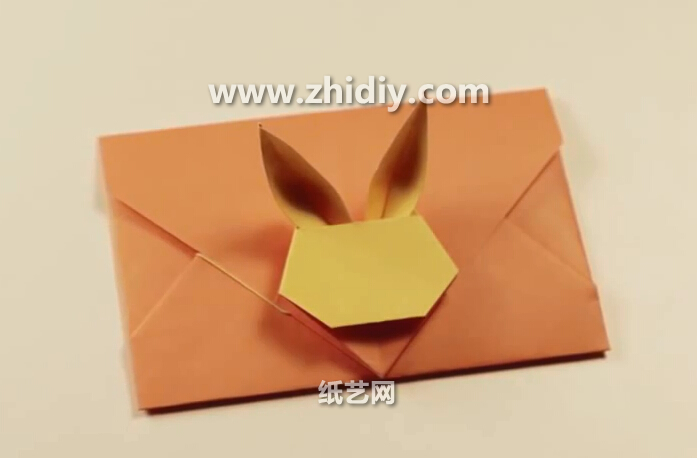威廉希尔公司官网
折纸大全威廉希尔中国官网
手把手教你制作出精美的折纸兔子信封礼物